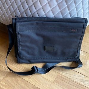 Rarely Used Tumi Notebook Bag with Phone pockets and Pen/Passport Pockets